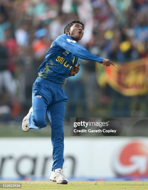 Akila Dananjaya of Sri Lanka celebrates dismissing Martin Guptil of New Zealand during the ICC World Twenty20 2012 Super Eights Group 1 match between...