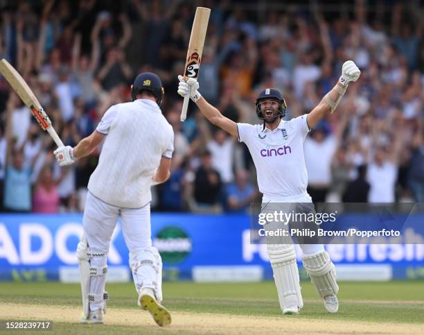 Mark Wood and Chris Woakes celebrate after England won the 3rd Test between England and Australia at Headingley on July 09, 2023 in Leeds, England.