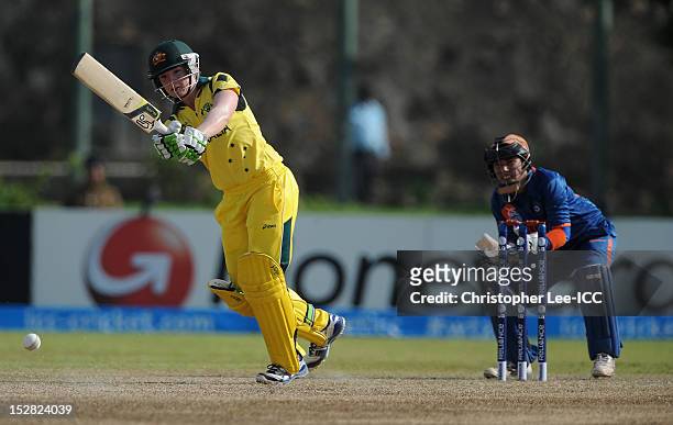 Jess Cameron of Australia in action as Sulakshana Naik of India watches during the ICC Women's World Twenty20 Group A match between Australia and...