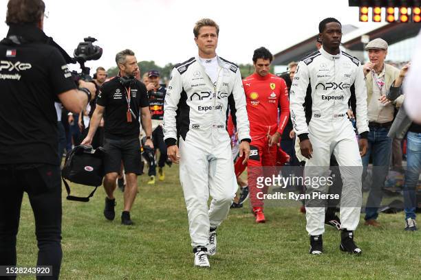 Brad Pitt, star of the upcoming Formula One based movie, Apex, and Damson Idris, co-star of the upcoming Formula One based movie, Apex, walk on the...