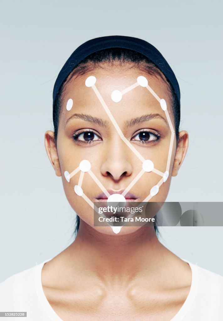 Woman with connecting dots on face