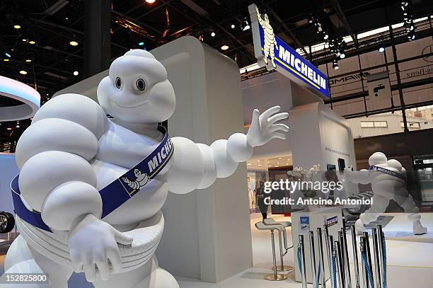 Statue of the Michelin 'Michelin Man' sits on display at the Paris Auto Show on September 27, 2012 in Paris, France. The Paris Motor Show runs...