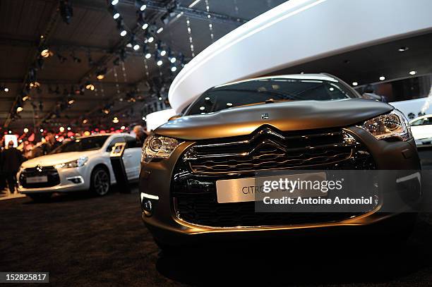 Citroen DS4 cars sit on display at the Paris Auto Show on September 27, 2012 in Paris, France. The Paris Motor Show runs September 29