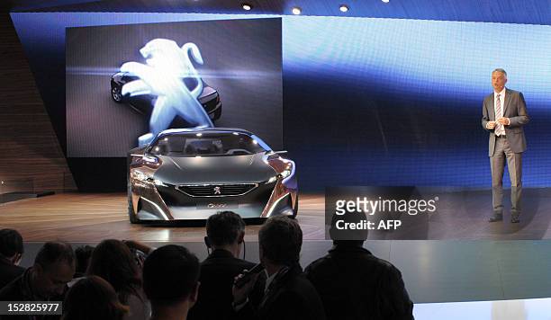 French car maker Peugeot Product Director, Xavier Peugeot speaks during his presentation of the Peugeot Concept car Onyx during the press days ahead...