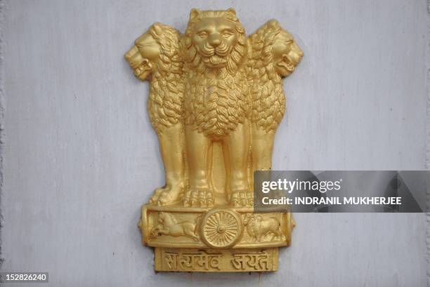 The Indian coat of arms, the Ashok Sthamb, is pictured on the gate of the Vidhan Bhavan - the Maharashtra Legislative Assembly building - in Mumbai...