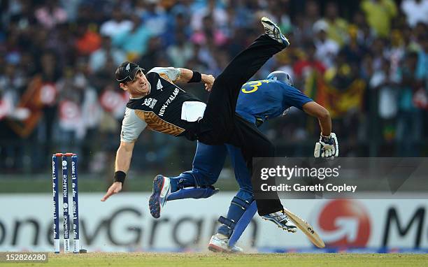 Nathan McCullum of New Zealand collides with Tillakaratne Dilshan of Sri Lanka during the ICC World Twenty20 2012 Super Eights Group 1 match between...