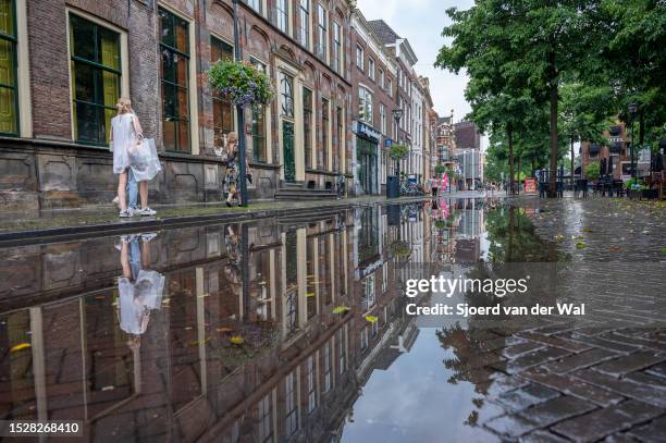 Flooded street in the city center of Zwolle in Overijssel after heavy rainfall during a summer thunderstorm on July 9, 2023 in Zwolle, The...