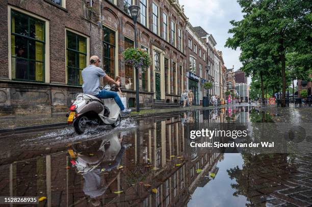 Flooded street in the city center of Zwolle in Overijssel after heavy rainfall during a summer thunderstorm on July 9, 2023 in Zwolle, The...