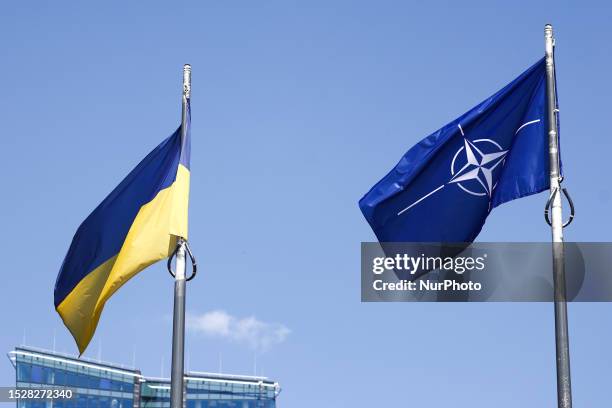 Flags of Ukraine and NATO are seen, while the NATO Summit is held in the city, in Vilnius, Lithuania on July 12, 2023.