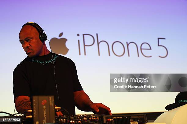 Jonah Lomu plays tunes during the launch of the new iPhone 5 on September 27, 2012 in Auckland, New Zealand. Telecom, with help of rugby great Jonah...