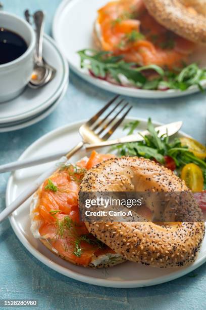 bagels smoked salmon fresh cheese - smoked salmon stock pictures, royalty-free photos & images