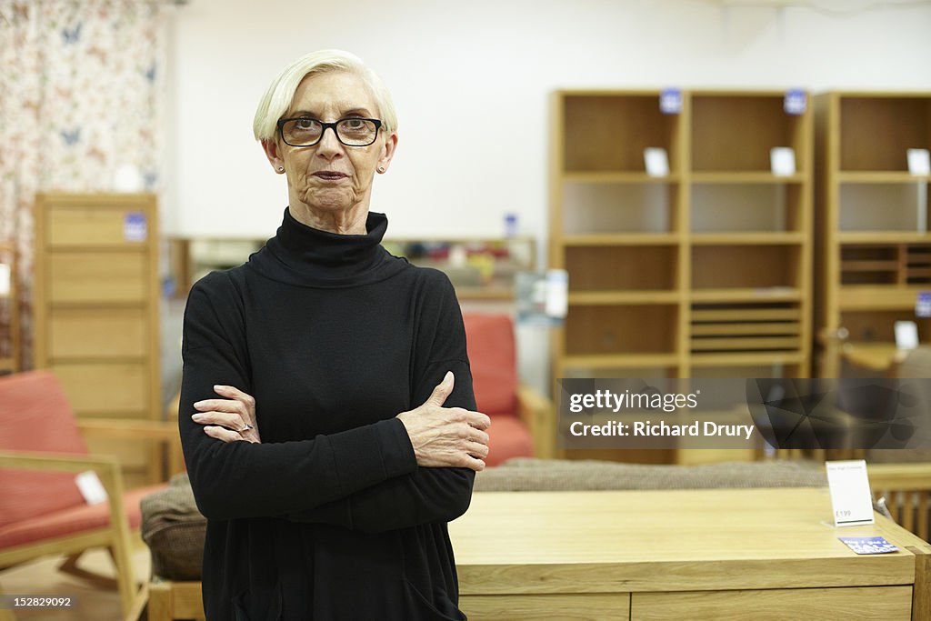 Furniture store manager in her shop