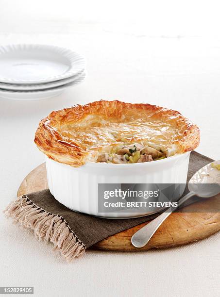 dish of baked chicken pie - puff pastry stock pictures, royalty-free photos & images