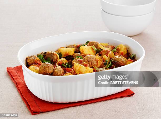 dish of meatball and potatoes - casserole stock pictures, royalty-free photos & images