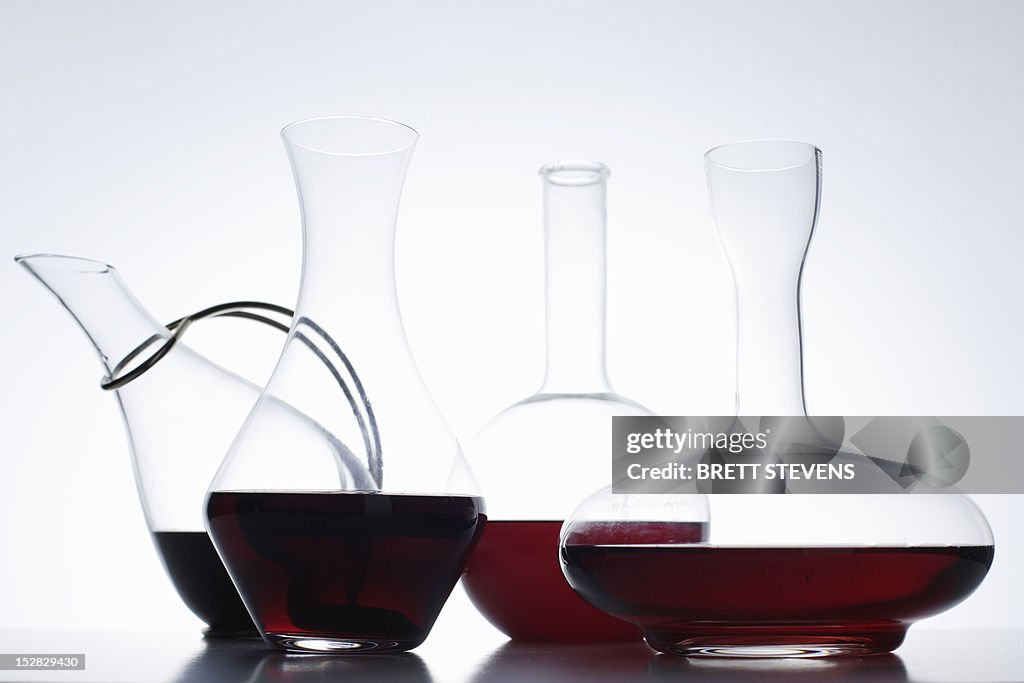 Close up of glass carafes of wine