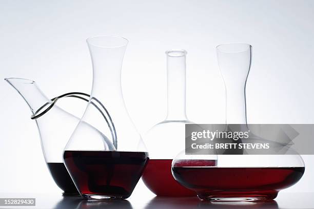 close up of glass carafes of wine - karaffin bildbanksfoton och bilder