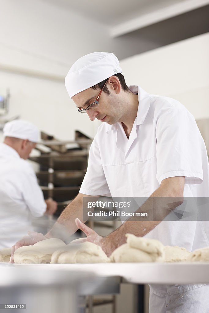 Chef baking in kitchen