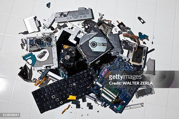pile of smashed computer parts - garbage pile stock pictures, royalty-free photos & images