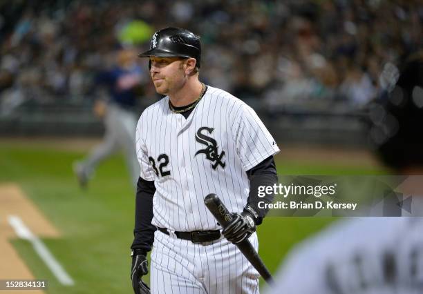 Adam Dunn of the Chicago White Sox walks off the field after striking out against the Cleveland Indians at U.S. Cellular Field on September 24, 2012...