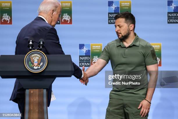 President Joe Biden shakes hand of Ukrainian President Volodomyr Zelensky during G7 Declaration of Joint Support for Ukraine during the high level...