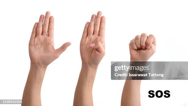 use sos hand signal if you are in danger,help signal in times of crisis,universal hand signal,on white.sos signal,distress signals help stop everyone's life crises - geste de la main photos et images de collection