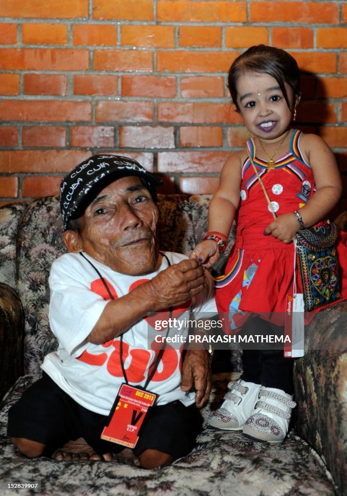 World's shortest man, Nepalese Chandra Bahadur Dangi poses while