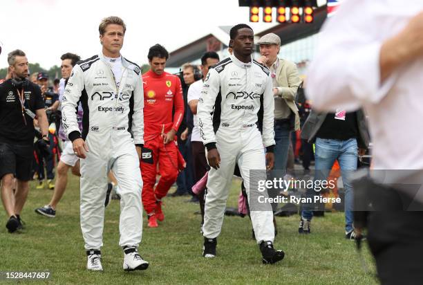 Brad Pitt, star of the upcoming Formula One based movie, Apex, and Damson Idris, co-star of the upcoming Formula One based movie, Apex, walk on the...