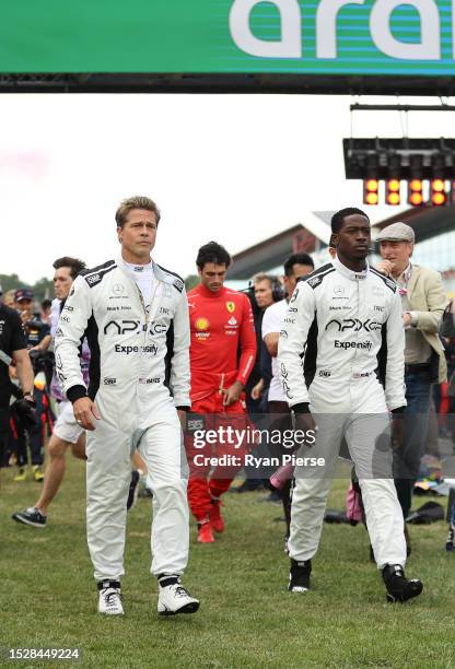 Brad Pitt, star of the upcoming Formula One based movie, Apex, and Damson Idris, co-star of the upcoming Formula One based movie, Apex, walk on the...