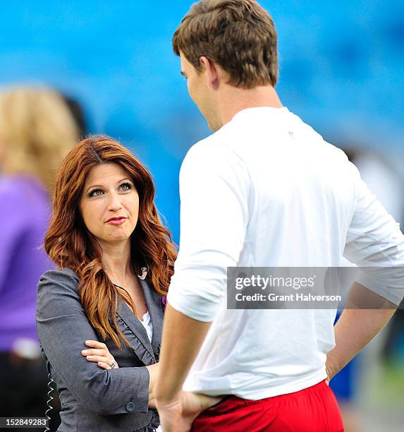 Sideline reporter Rachel Nichols talks with Eli Manning of the New York Giants before a game against the Carolina Panthers at Bank of America Stadium...