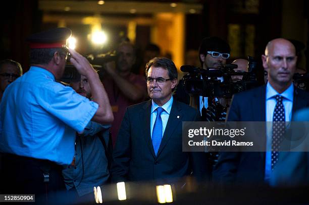 The Catalan President Artur Mas leaves the Catalan Parliament after passing the proposal for the right of the Catalan people to hold a referendum on...