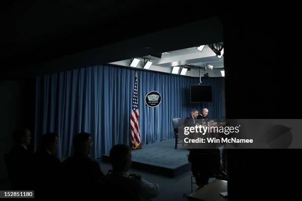 Secretary of Defense Leon Panetta and Chairman of the Joint Chiefs of Staff Gen. Martin Dempsey answer questions during a press conference at the...