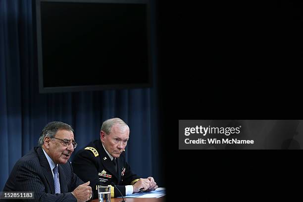 Secretary of Defense Leon Panetta and Chairman of the Joint Chiefs of Staff Gen. Martin Dempsey answer questions during a press conference at the...