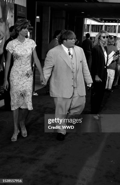 Lorri Bagley and Chris Farley attend the Los Angeles premiere of "Nine Months" at the Cineplex Odeon Century City Cinemas in Century City,...