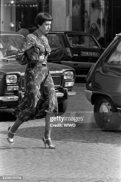 Candid street style photography taken on the streets of Paris on August 19, 1974.