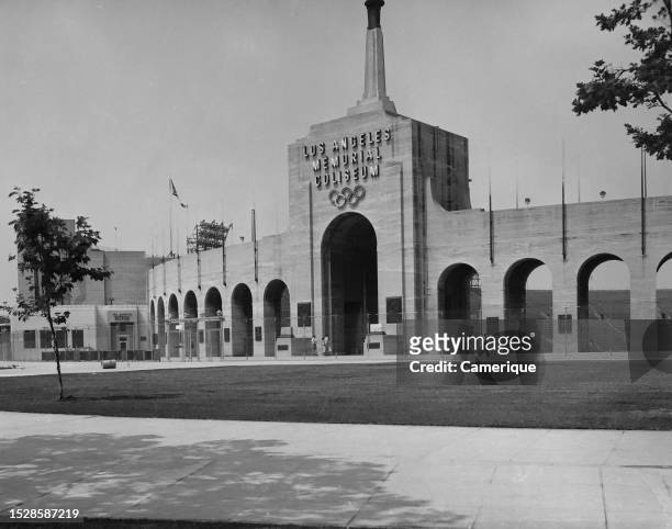 Exterior view outside the front gate of the Los Angeles Memorial Coliseum back in the fifties. Site of 1932 Olympic Games.