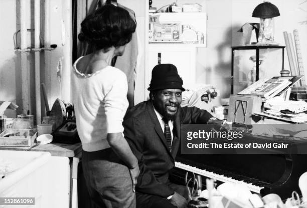Jazz musician and composer Thelonious Monk and his wife Nellie Monk pose for a portrait at home in November, 1963 in New York City, New York.