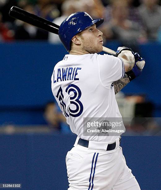 Brett Lawrie of the Toronto Blue Jays hits a two-run home run against the New York Yankees during MLB action at the Rogers Centre September 27, 2012...
