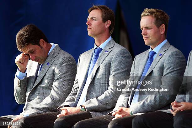 European Team captain Jose Maria Olazabal wipes reacts to a tribute to Seve Ballesteros at the Opening Ceremony for the 39th Ryder Cup at Medinah...
