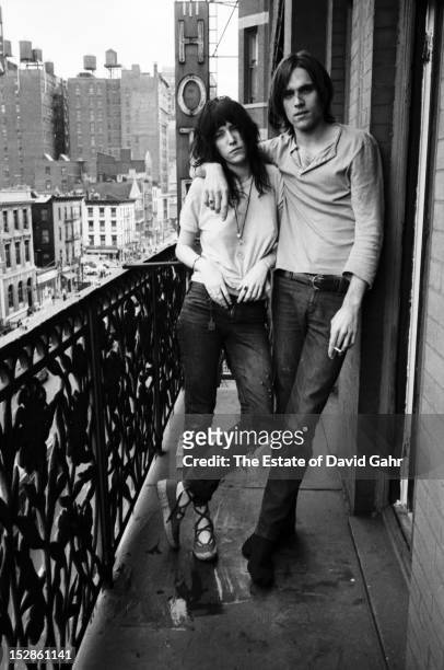 Poet and singer Patti Smith and singer songwriter Eric Anderson pose for a portrait on May 4, 1971 on a balcony at the Hotel Chelsea in New York...