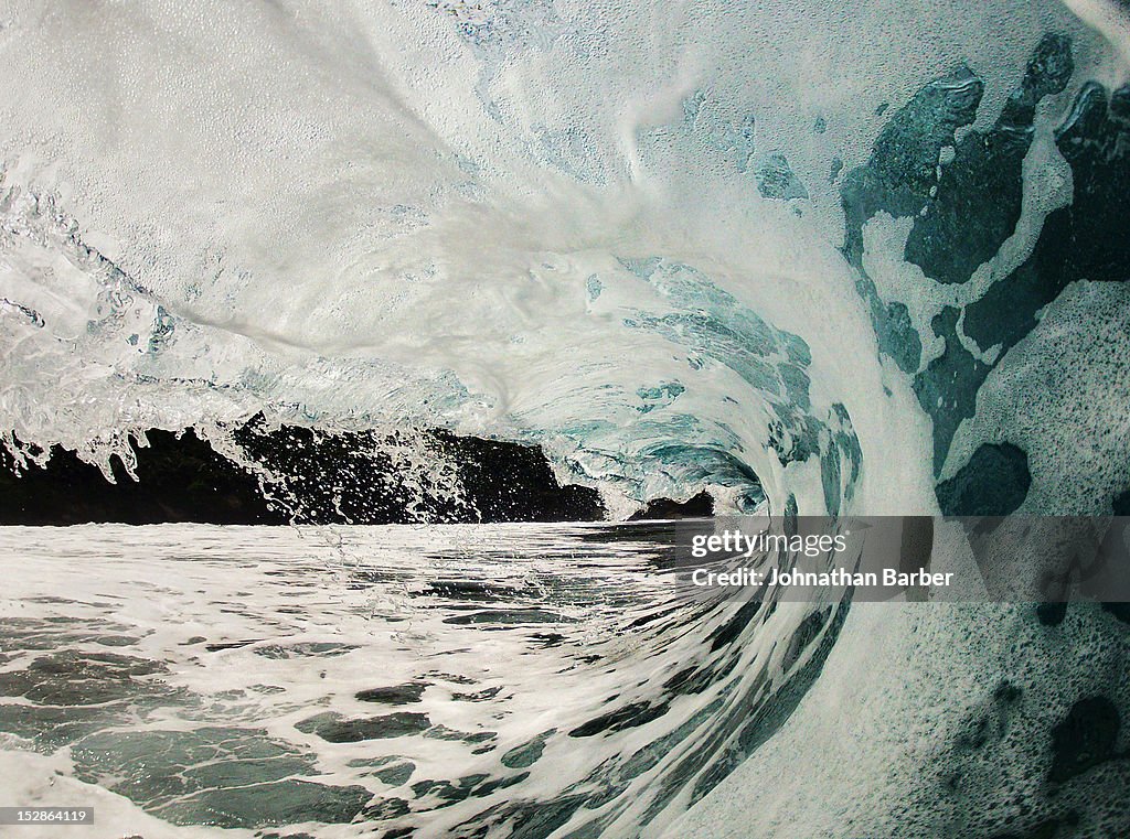Wave breaking over shallow reef