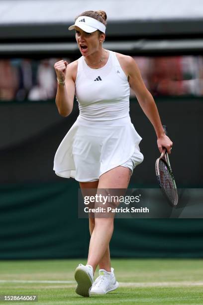 Elina Svitolina of Ukraine celebrates against Victoria Azarenka in the Women's Singles fourth round match during day seven of The Championships...