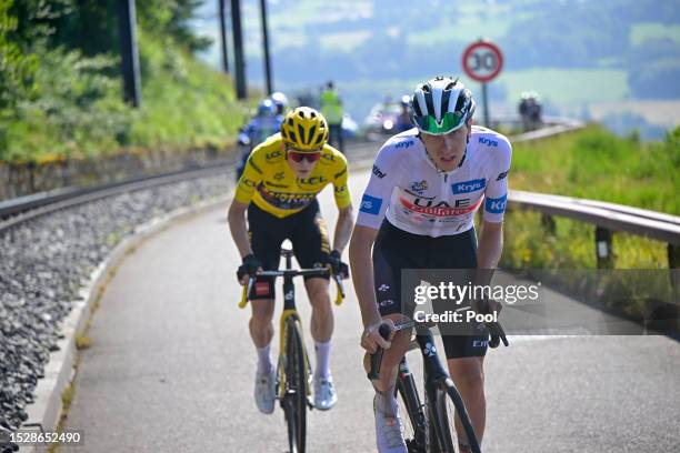 Tadej Pogacar of Slovenia and UAE Team Emirates - White Best Young Rider Jersey attacks to Jonas Vingegaard of Denmark and Team Jumbo-Visma - Yellow...