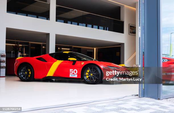 The Ferrari SF90 Stradale at HROwen Ferrari in Hatfield, Hertfordshire. This Ferrari is painted in a special livery to celebrate Ferrari's Le Mans...