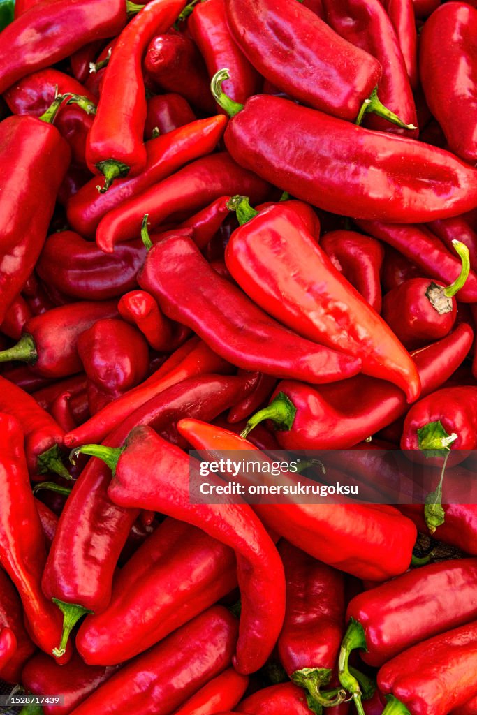 Heap of fresh red capia peppers