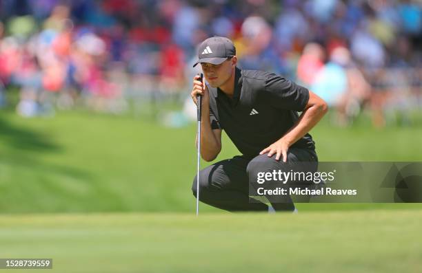 Ludvig Aberg of Sweden lines up a putt on the 18th green during the final round of the John Deere Classic at TPC Deere Run on July 09, 2023 in...