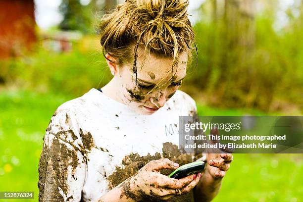teen girl covered in mud - people covered in mud stock pictures, royalty-free photos & images