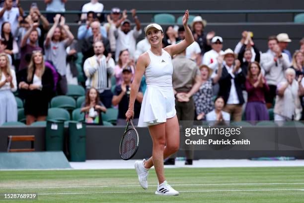 Elina Svitolina of Ukraine celebrates winning match point against Victoria Azarenka in the Women's Singles fourth round match during day seven of The...