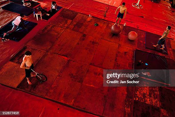 Students train and exercise during the lessons in the circus school Circo para Todos, 29 May 2012 in Cali, Colombia. Circo Para Todos , founded by...