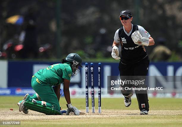 Katey Martin of New Zealand takes the wicket of Trisha Chetty of South Africa during the ICC Women's World Twenty20 Group B match between New Zealand...