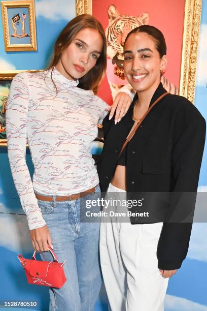 Hana Cross and Gurlaine Kaur Garcha attend the Longchamp x Toiletpaper Pop Revolution launch party on July 12, 2023 in London, England.